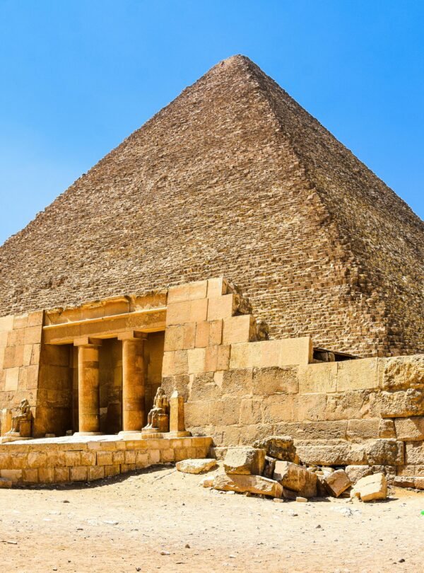 Stunning wide-angle view of the Great Pyramid of Giza, showcasing ancient architectural brilliance.