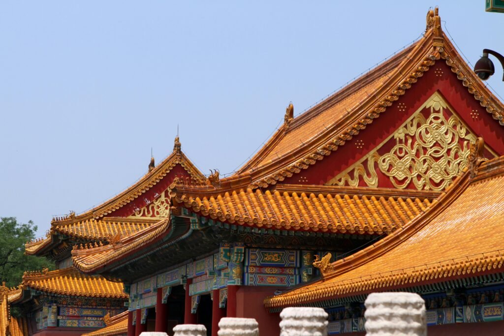 Explore the stunning architecture of the Forbidden City with its vibrant roofs and intricate designs.