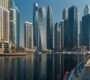 Explore the towering skyscrapers of Dubai Marina reflecting beautifully on the water.