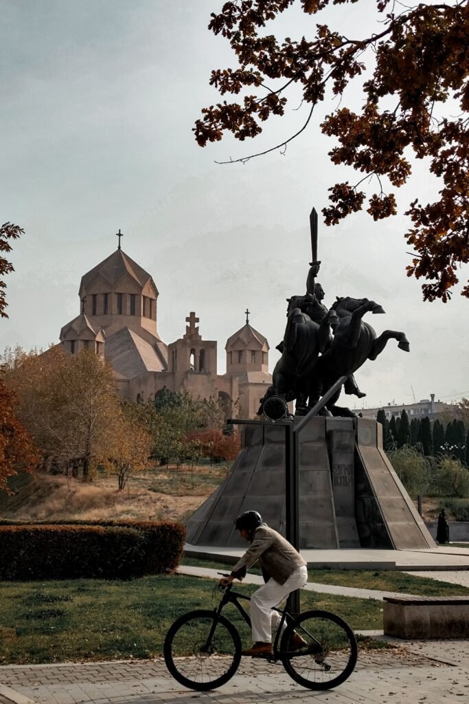 Scenic view of Saint Gregory the Illuminator Cathedral and a statue in Yerevan, Armenia during autumn.